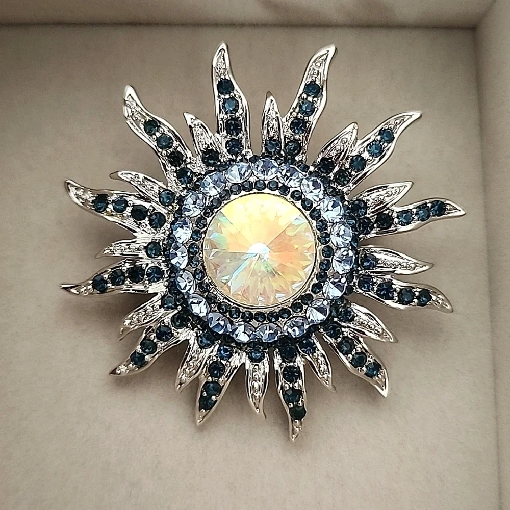 Silver and Blue Starburst Sun Brooch Pin